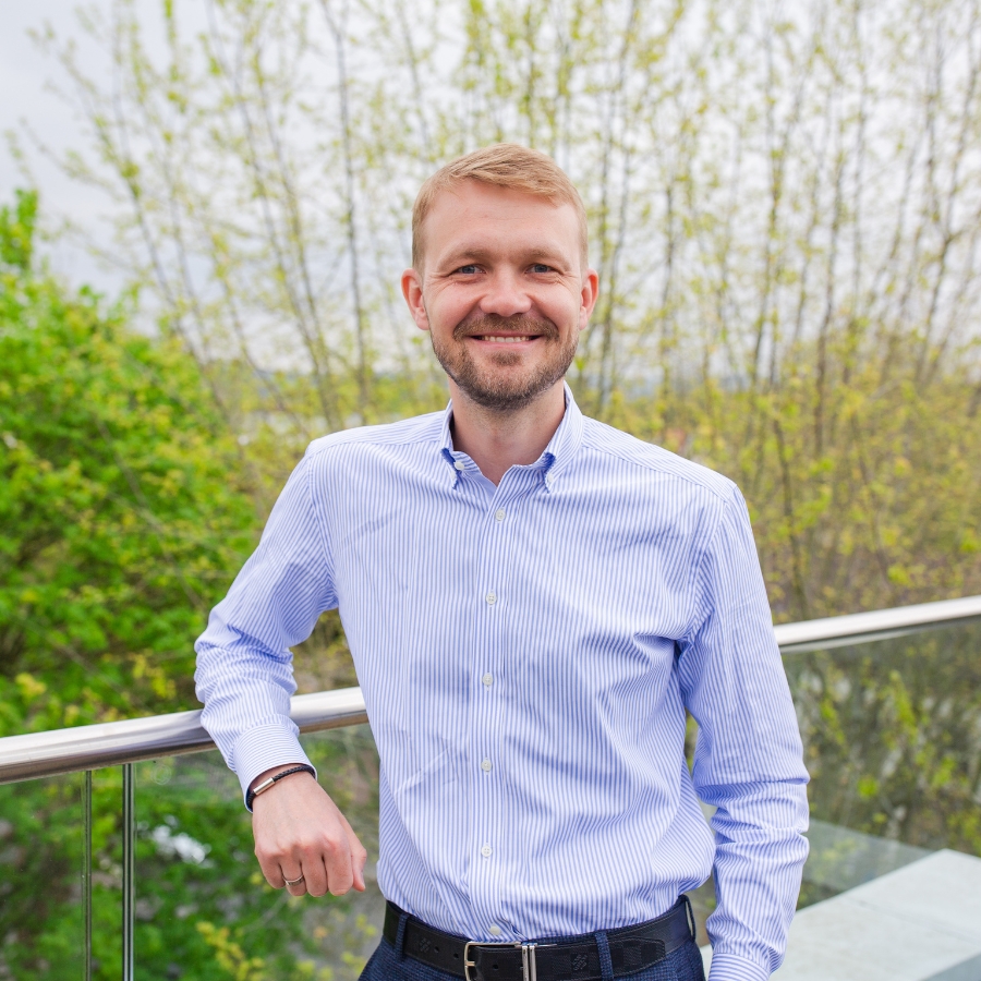 Ilya is pictured outside at the Circle Foods office.